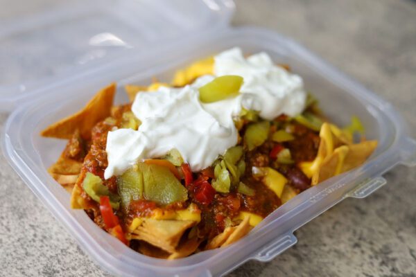 closeup shot of a box of cheese Nachos