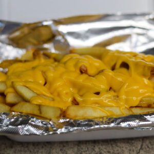 closeup shot of delicious Cheese Fries