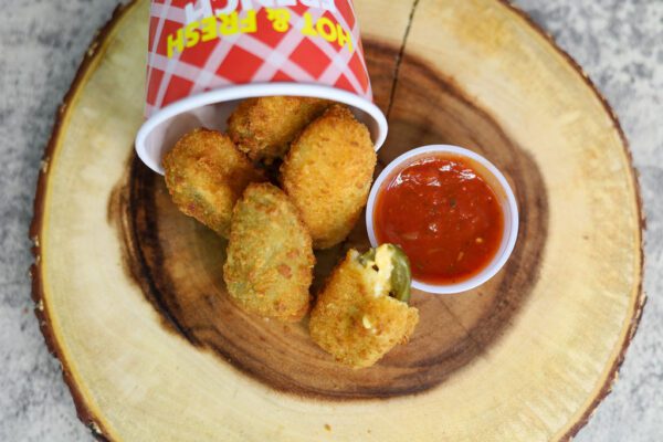 Jalapeno Poppers with a red sauce